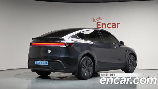 Tesla Model Y 2025 — photo 2