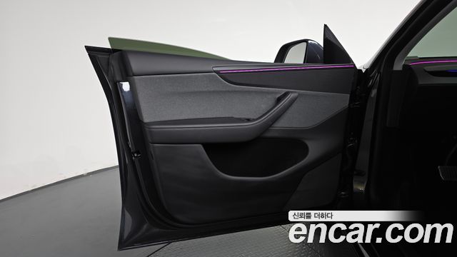 Tesla Model Y 2025 — photo 12