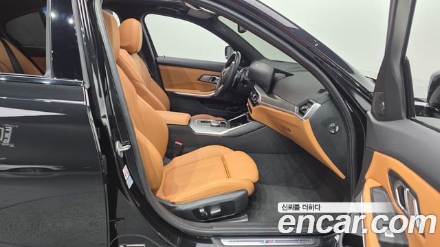 BMW 3-Series 2023 — photo 16