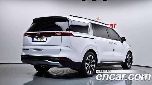 Kia Canival 2021 — photo 2