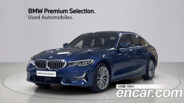 BMW 3-Series 2022 — photo 1
