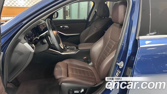 BMW 3-Series 2022 — photo 10