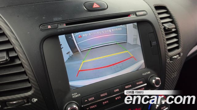 Kia K3 2013 — photo 22