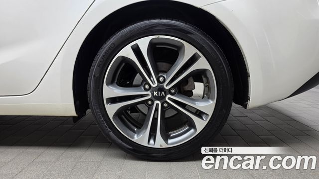 Kia K3 2013 — photo 7