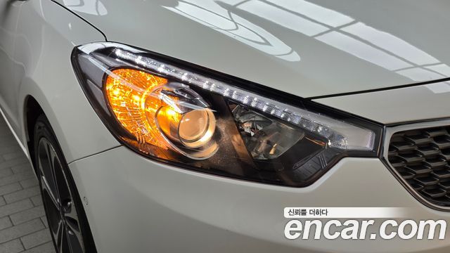 Kia K3 2013 — photo 8