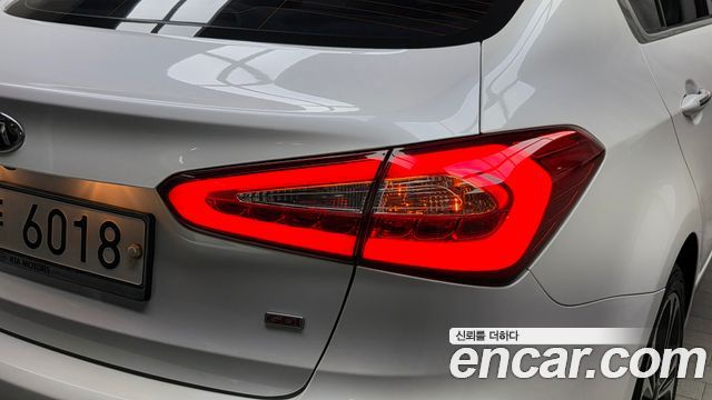 Kia K3 2013 — photo 9