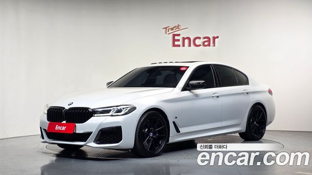 BMW 5-Series 2023 — photo 1