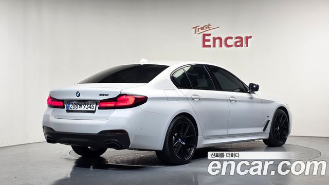 BMW 5-Series 2023 — photo 2