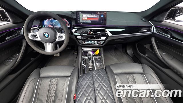 BMW 5-Series 2023 — photo 10