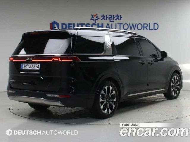 Kia Canival 2023 — photo 2