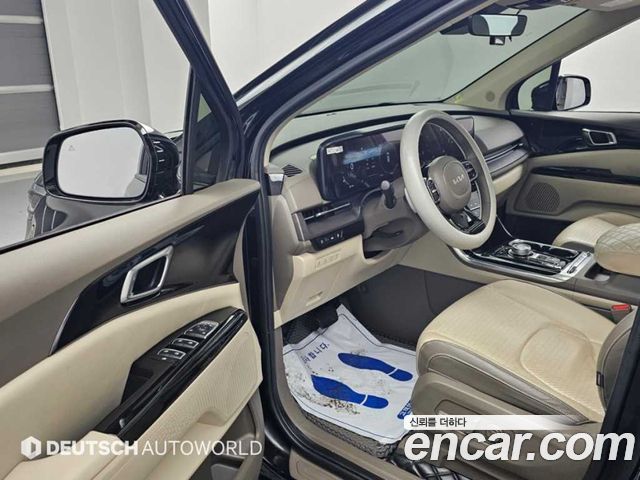 Kia Canival 2023 — photo 11