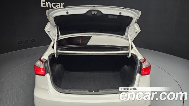 Kia K3 2015 — photo 20