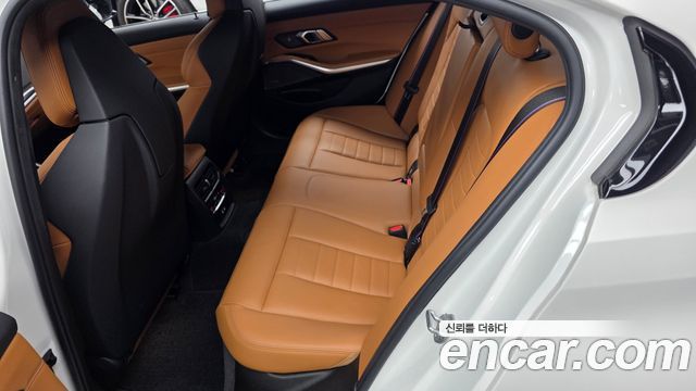 BMW 3-Series 2022 — photo 16