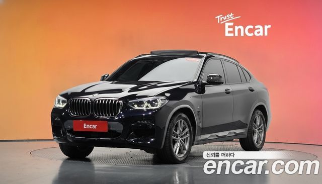 BMW X4 2021 — photo 1