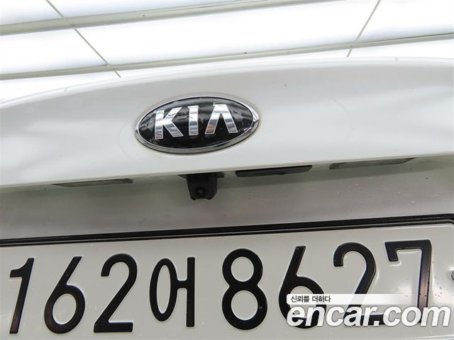 Kia K3 2013 — photo 16