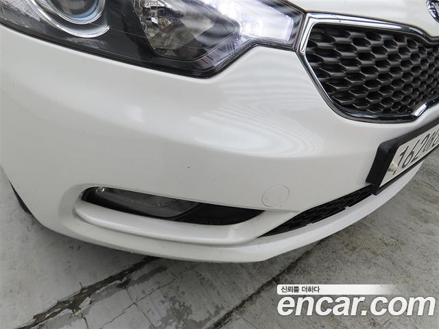 Kia K3 2013 — photo 17
