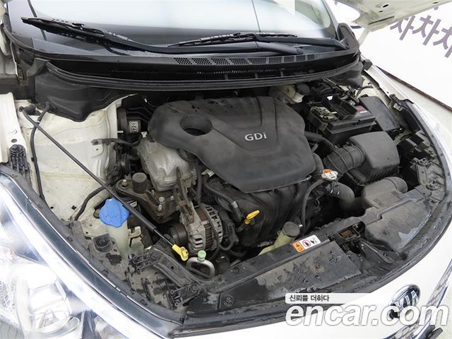 Kia K3 2013 — photo 19