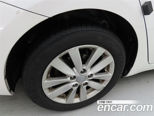 Kia K3 2013 — photo 20