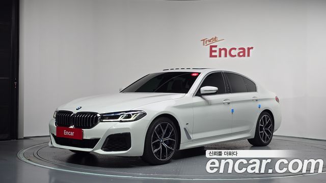 BMW 5-Series 2023 — photo 1
