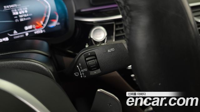 BMW 5-Series 2023 — photo 27