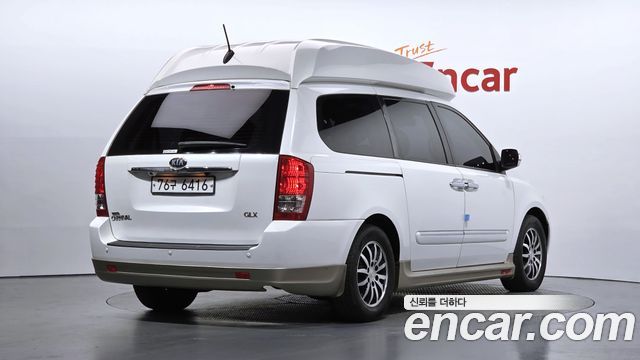 Kia Canival 2014 — photo 2