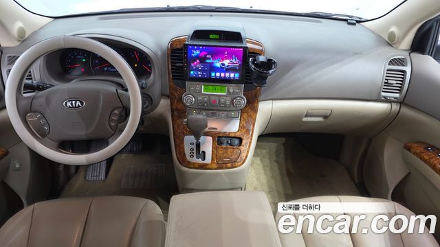 Kia Canival 2014 — photo 10