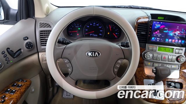 Kia Canival 2014 — photo 21
