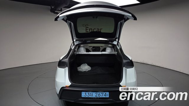 Tesla Model Y 2025 — photo 20