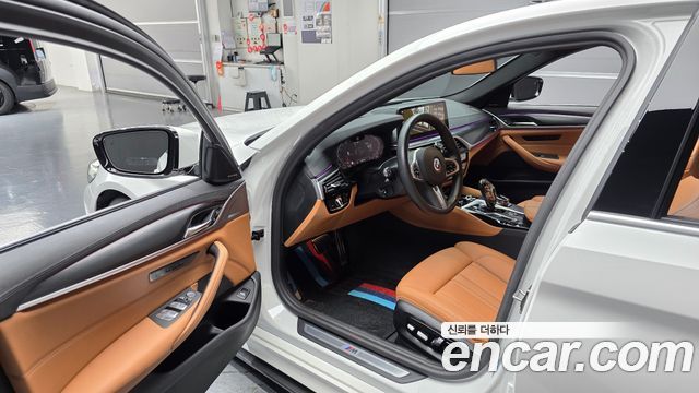 BMW 5-Series 2023 — photo 13