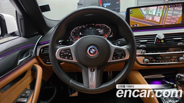 BMW 5-Series 2023 — photo 19
