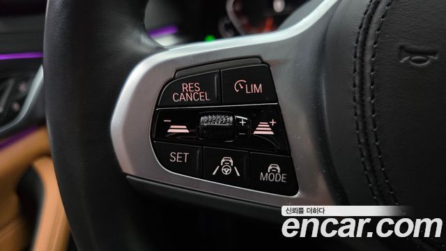 BMW 5-Series 2023 — photo 22