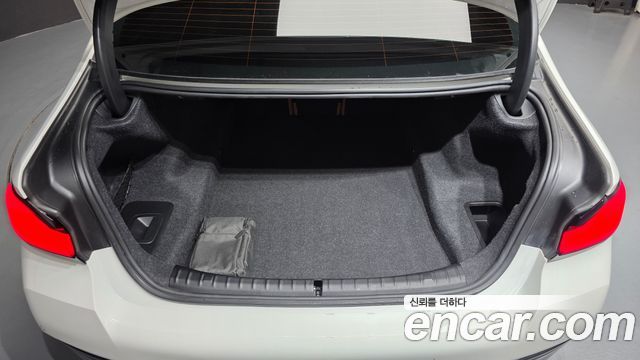 BMW 5-Series 2023 — photo 24