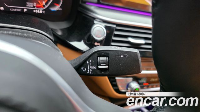 BMW 5-Series 2023 — photo 30