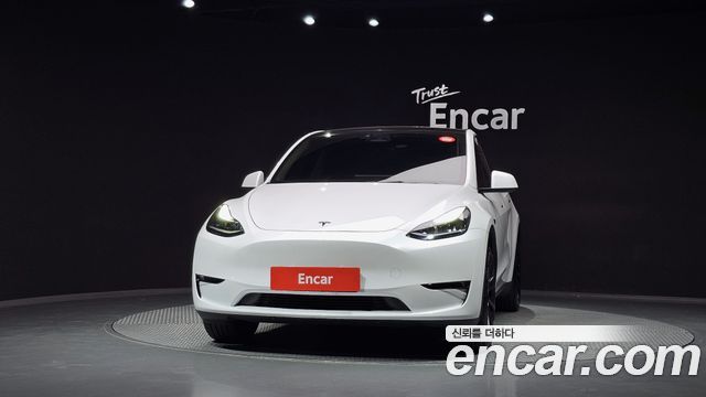 Tesla Model Y 2024 — photo 3