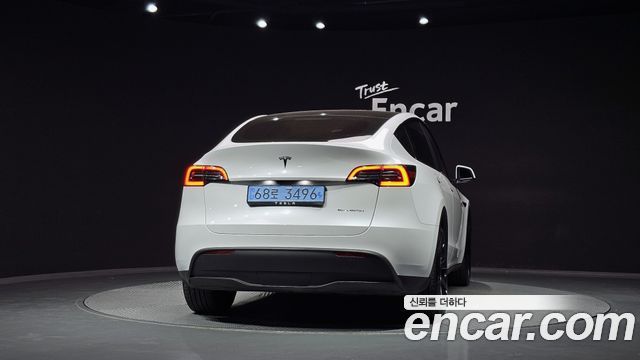 Tesla Model Y 2024 — photo 4