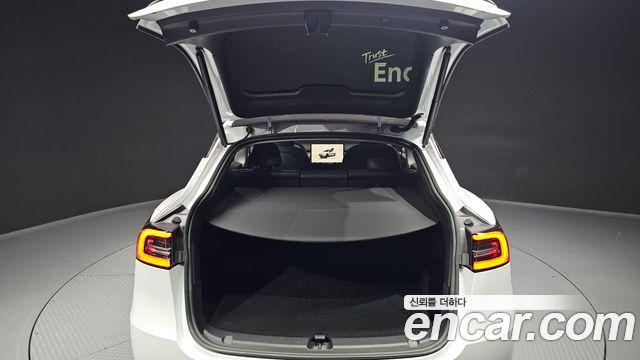 Tesla Model Y 2024 — photo 20