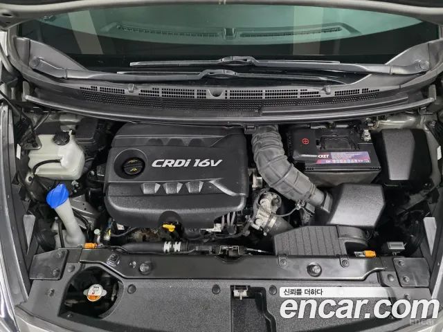 Kia Carens 2014 — photo 20
