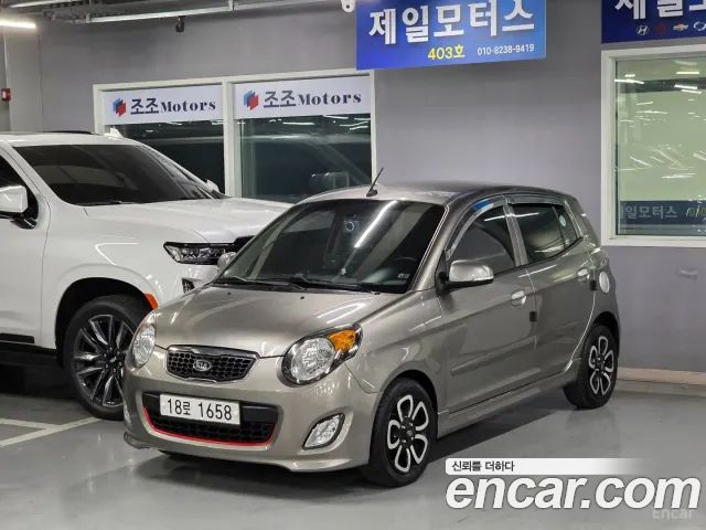 Kia morning 2011 — photo 1