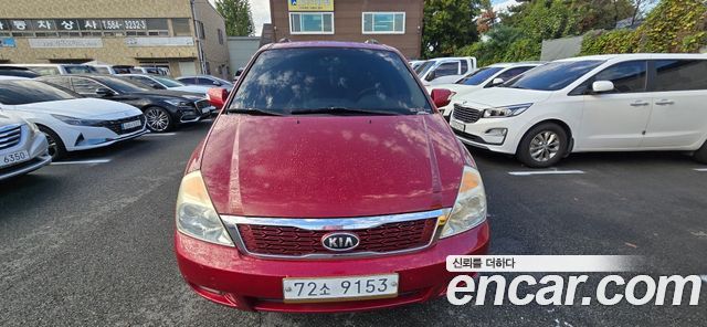 Kia Canival 2012 — photo 2