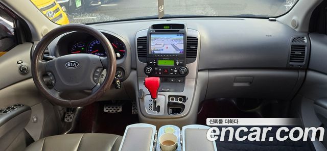 Kia Canival 2012 — photo 3