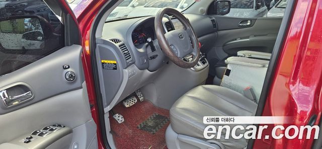 Kia Canival 2012 — photo 5