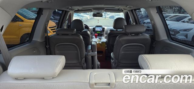 Kia Canival 2012 — photo 7