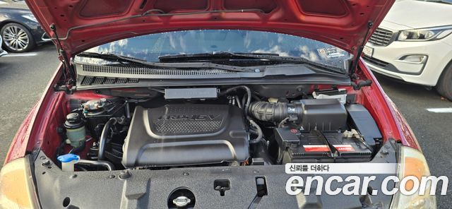 Kia Canival 2012 — photo 10
