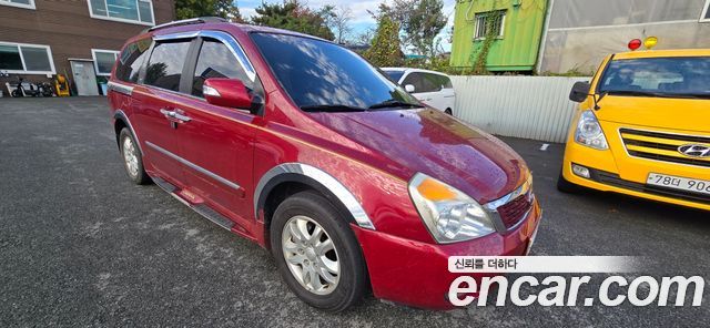 Kia Canival 2012 — photo 11
