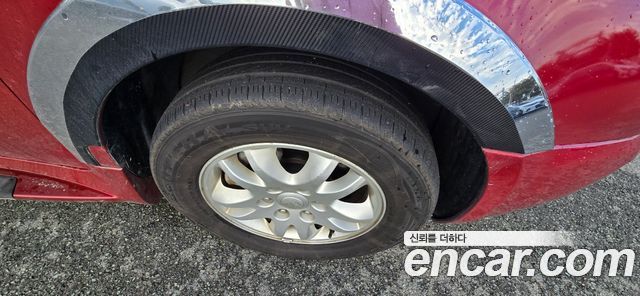 Kia Canival 2012 — photo 12