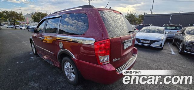 Kia Canival 2012 — photo 14