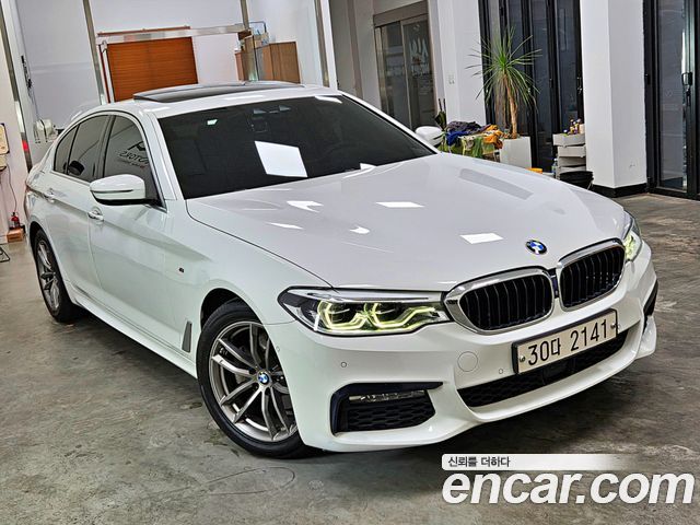 BMW 5-Series 2018 — photo 1