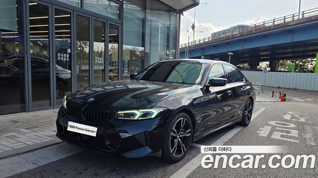 BMW 3-Series 2023 — photo 1
