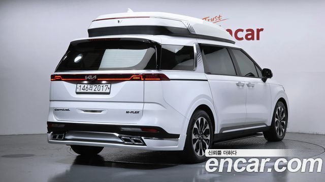 Kia Canival 2021 — photo 2