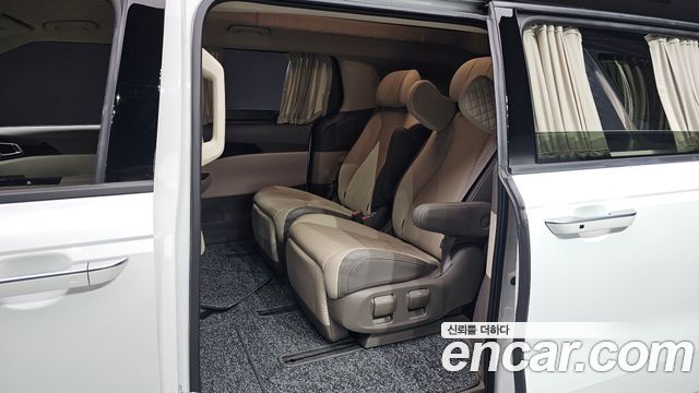 Kia Canival 2023 — photo 11